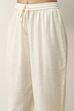 Off-White Cotton Solid Regular Pants image number 1