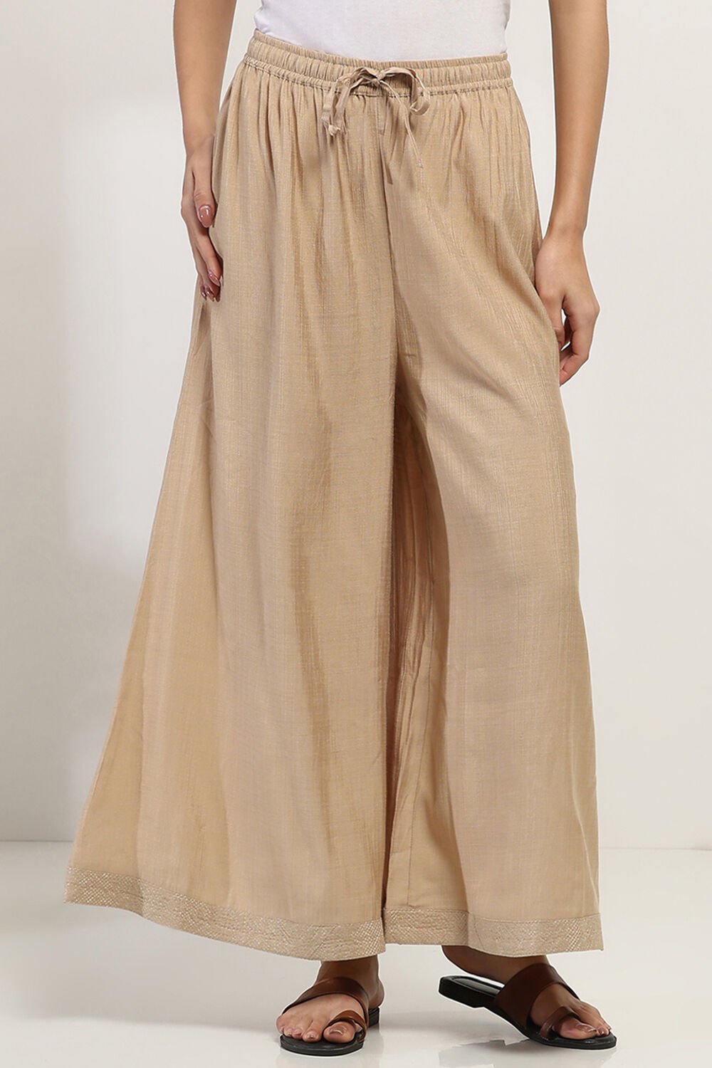 Gold-Toned Solid Flared Palazzos image number 5