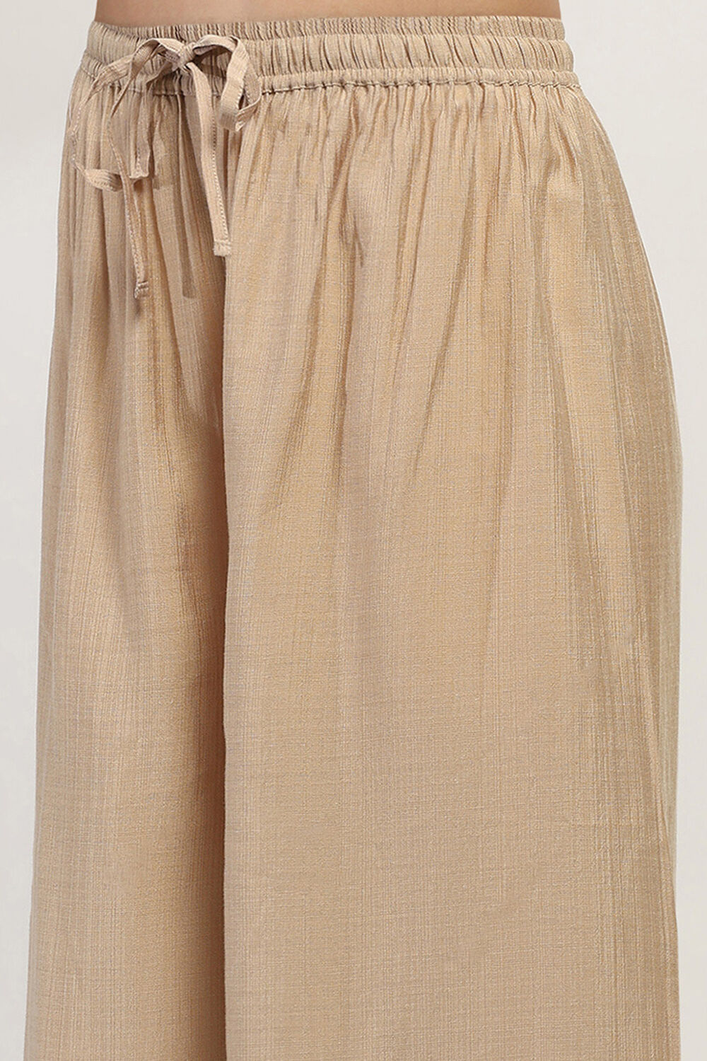 Gold-Toned Solid Flared Palazzos image number 1