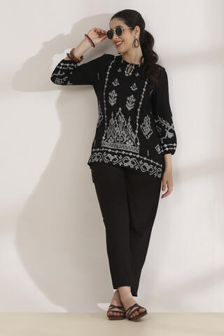 Rangriti Rayon Solid Flared Casual Palazzo in Black